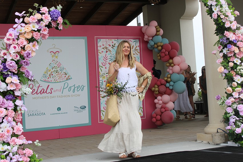 Brittany Fordham was the first model to take to the runway during the Petals and Poses fashion show at Waterside Place May 10.