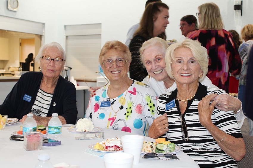 Gerri Nagle, Del Falcone, Rita Lynch and Joyce Welch join a luncheon at Father Edward Pick Parish Hall after the special Sunday service.