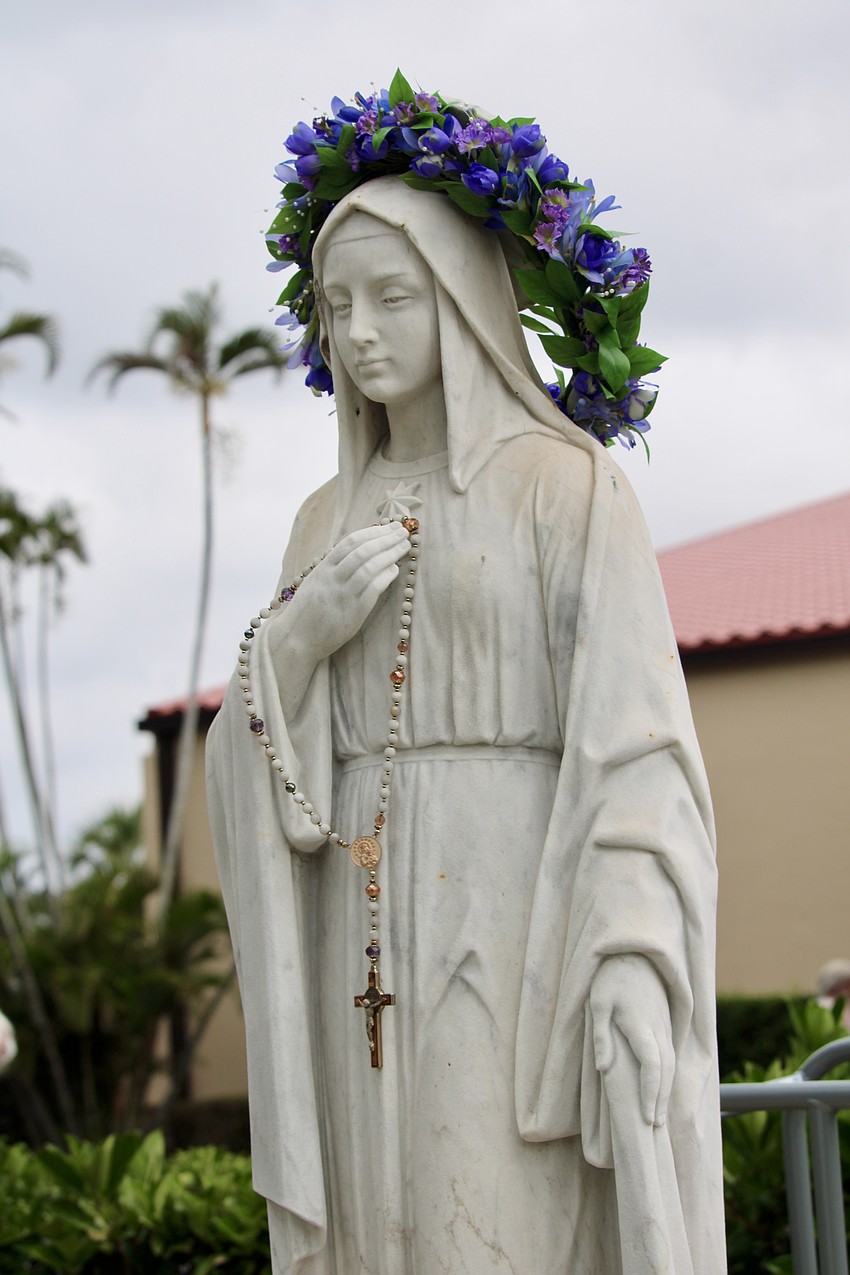 On a special Mother's Day, members of St. Mary, Star of the Sea, Catholic Church crowned the statue outside the church.