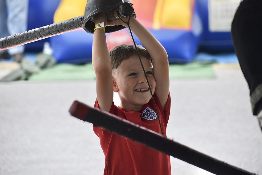 Derek Meacock, 7, tries his hand at swordplay with the Society for Creative Anachronism.
