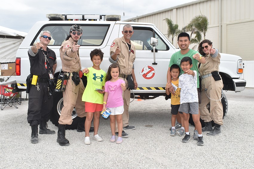 Brandon Hinnenkamp, Rob Righter, Guy Norman and Autumn Norman of the Suncoast Ghostbusters met Sarasota's Hudson Fergeson, 9, his sister Madeline Ferguson, 5, their cousin Henry Nguyen, 5, uncle Nam Nguyen, and cousin Oliver Nguyen, 8