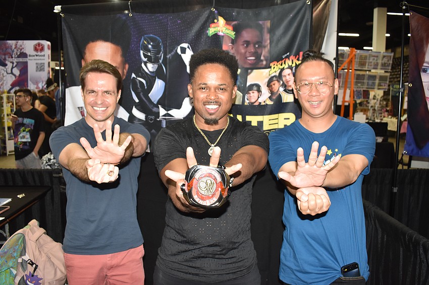 Branan Jacobs and Tony Vongsakhamphouy of Sarasota met Walter Emanuel Jones (center), who played Zack Taylor, the Black Power Ranger in Mighty Morphin Power Rangers.