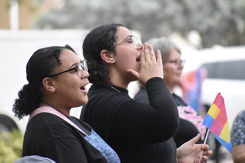 Ariyana Enis and her friend Neela Roman cheer on the band Hovercar.