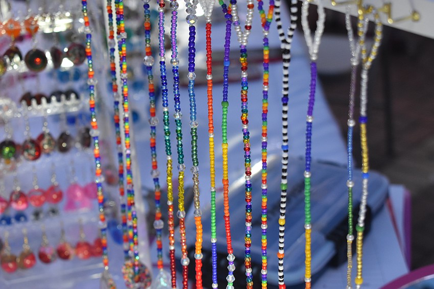 Jewelry by Sivan Greier is on display.