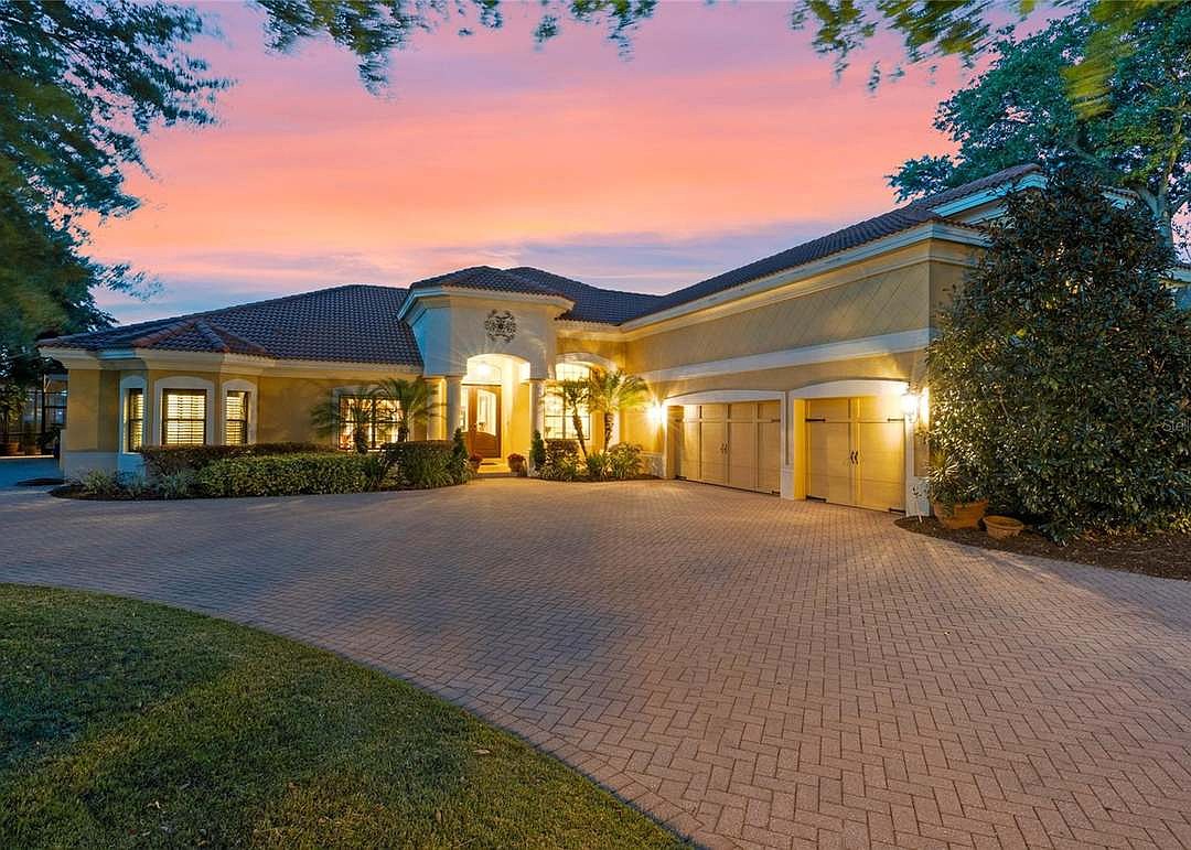 The home at 11954 Provincial Way, Windermere, sold May 8, for $1,999,900. This Arthur Rutenberg-designed custom home sits on a private lakefront lot. The sellers were represented by Brigitte Thyssen Elzarki, Coldwell Banker Realty.