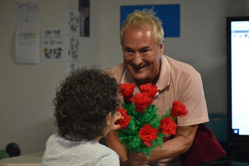 Kevin Spencer performs in a Fruitville Elementary classroom.