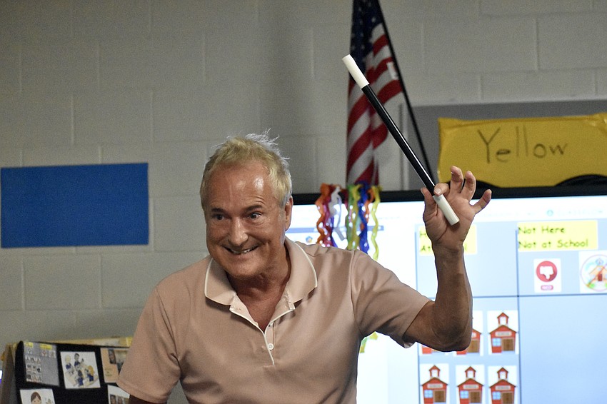 Kevin Spencer performs in a Fruitville Elementary classroom.
