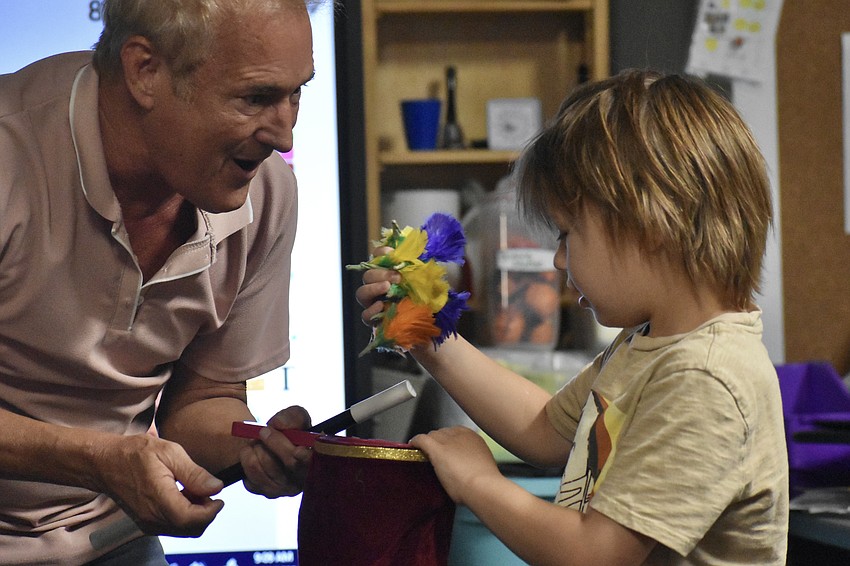 Kevin Spencer performs in a Fruitville Elementary classroom.