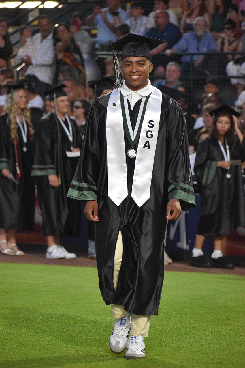 Cullen Hall McRae II, a member of SGA (LRHS Student Government) is all smiles as his name is called to receive his diploma.