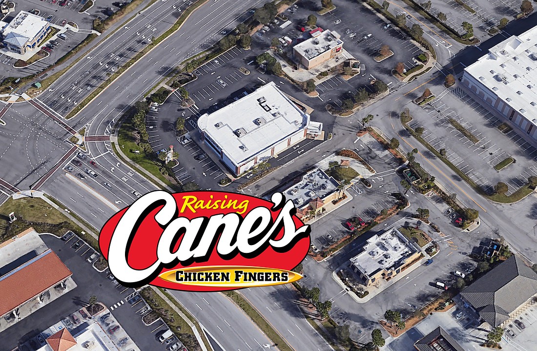 The Raising Cane's Chicken Fingers along Gate Parkway in the Town Center area next to a CVS and Zaxbys.