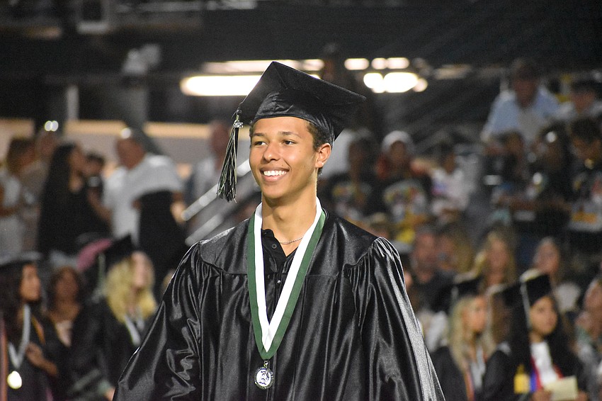 Marco Ulstad is all smiles when his name is called to receive his diploma.