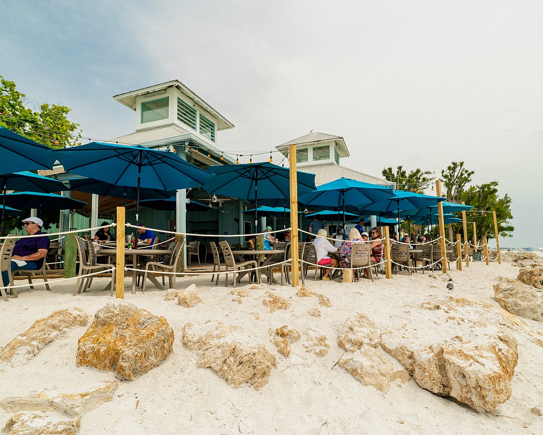 Sandbar Seafood + Spirits features beachside dining on Anna Maria Island.