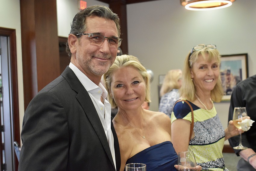 Paul Fiumano, Alyssa Fiumano and Victoria Campbell play blackjack for a good cause.