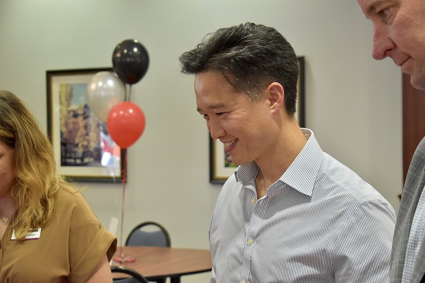 Steve Song can't help but smile when he sees two face cards laid before him in blackjack.
