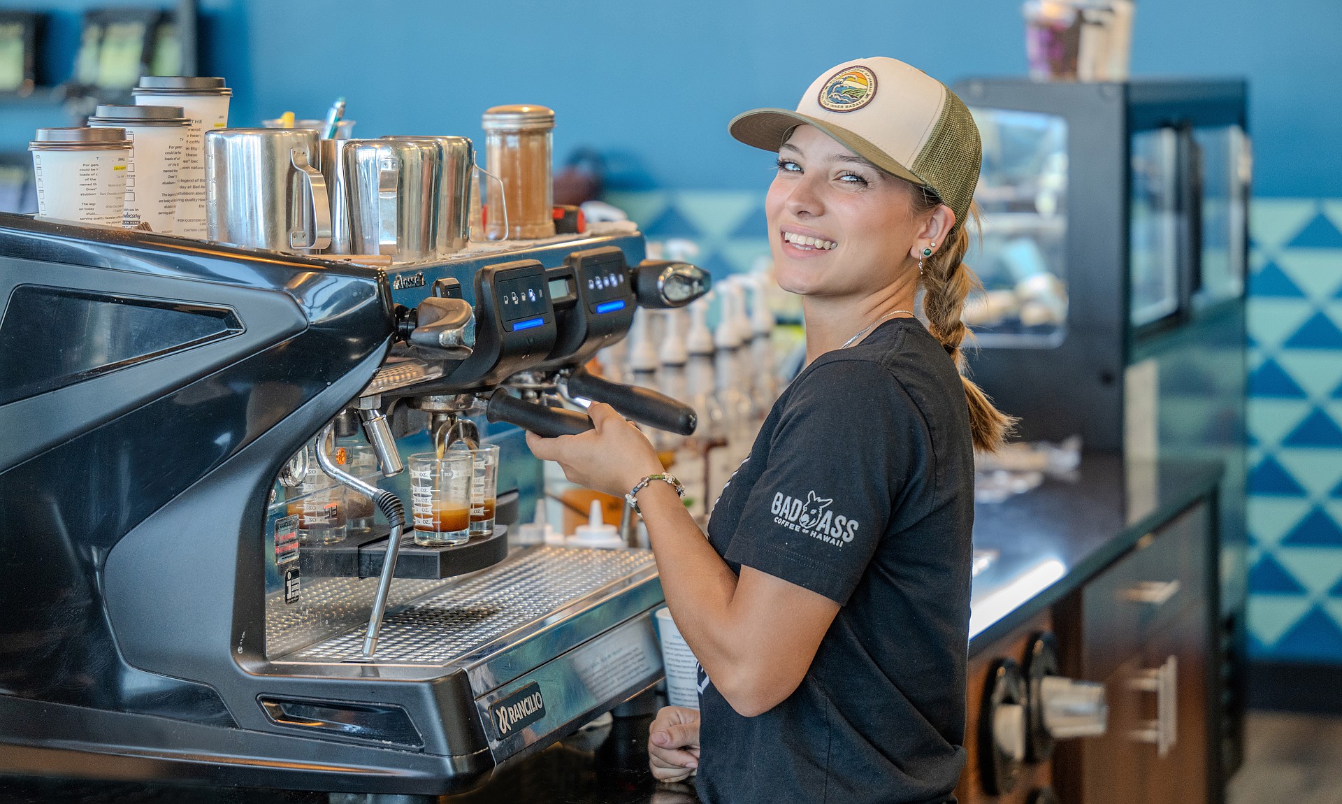 Isabella DuCharme brings island energy to every espresso pull at Bad Ass Coffee, where each cup starts with beans grown in paradise.