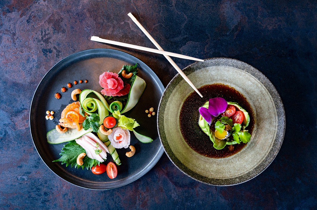 Tsunami's Sashimia appetizer mixes sashimi, crunch and color for a dish that's as fun to admire as it is to devour. The tuna tartare is artful and flavorful — wrapped in avocado, crowned with a quail egg and an edible flower and served in a savory ponzu sauce.