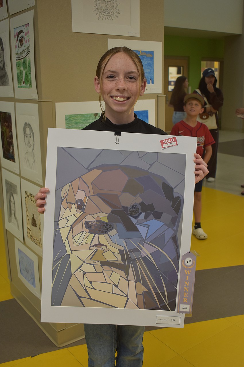 Alexa Pressimone, a seventh grader, created a picture of an otter in Adobe Illustrator by tracing over a photo of an otter using shadows to determine where different colors were needed.