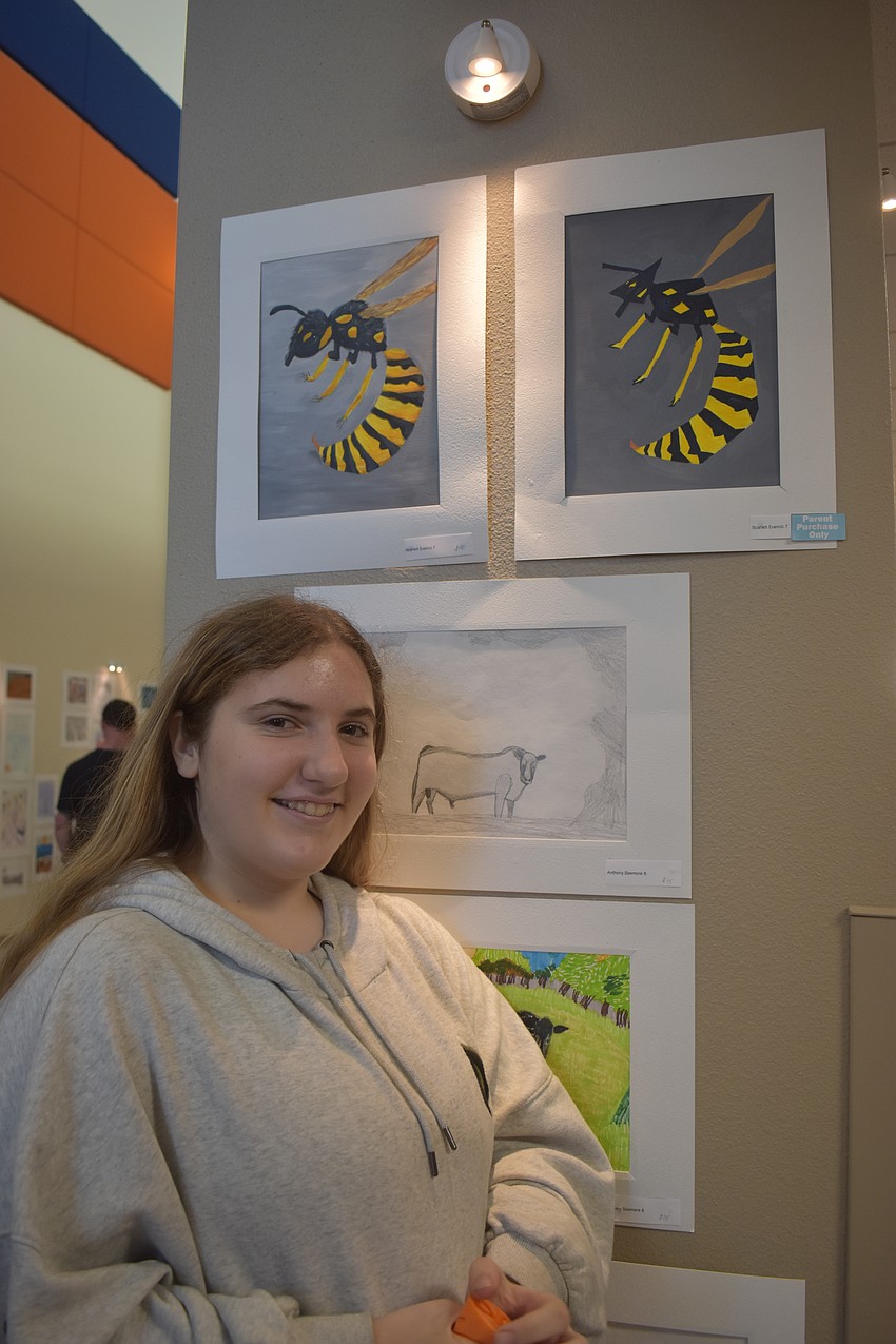 Scarlett Evancis, a seventh grade student, chose to create pieces of wasps. The piece on the left is more realistic with the coloring and fluff shown. The one on the right is more abstract.