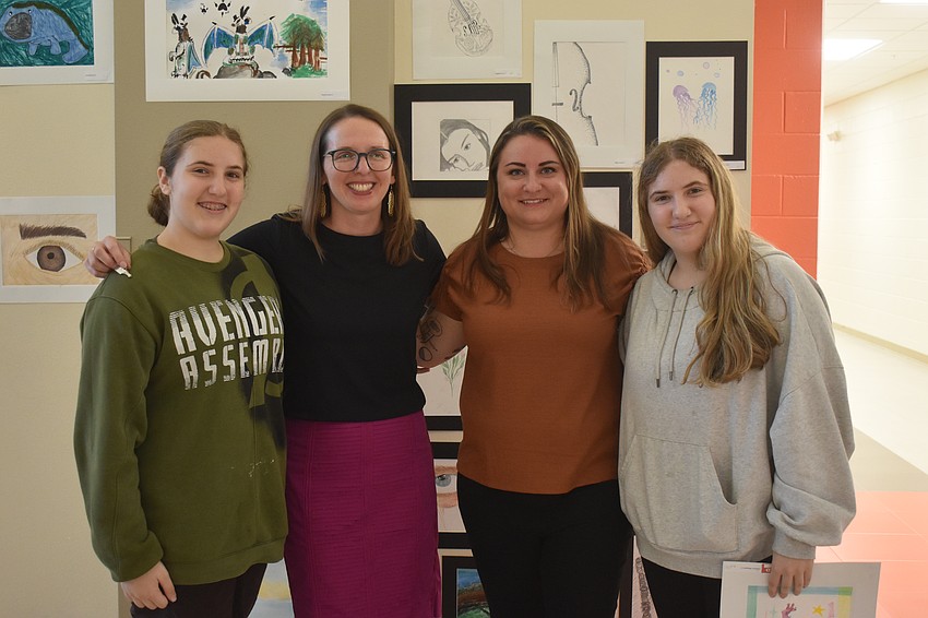 Amelia Evancic, Denise Mueller, Katelyn Reyes and Scarlett Evancic have been planning the logistics of the art show or creating art for it since August.