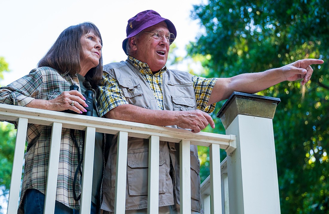 Norman and Ethel Thayer (starring Mike Funaro and Joanne van Zyl) spot wildlife from the porch of their Maine cottage. Photo courtesy of Mike Kitaif