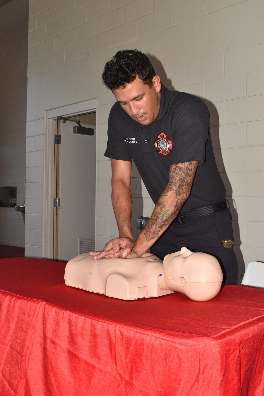 Firefighter/EMT Eduardo Torres demonstrates CPR.

Brian Nadler, Assistant Chief of EMS, said for the department, the Heart Safe Community award was 