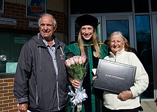 Samantha Esposito celebrates her graduation with grandparents Mabel and Anthony.
