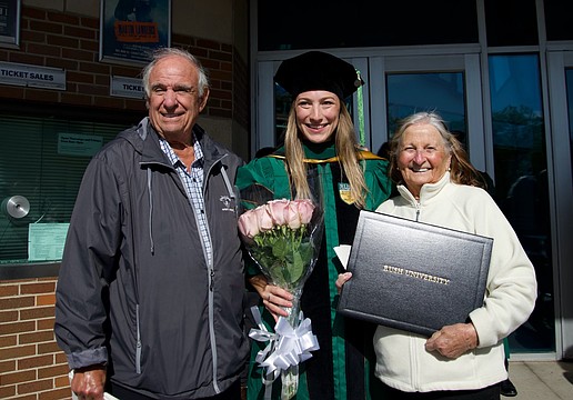 Samantha Esposito celebrates her graduation with grandparents Mabel and Anthony.
