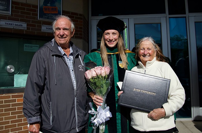 Samantha Esposito celebrates her graduation with grandparents Mabel and Anthony.