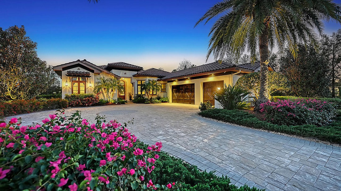 A Lake Club home at 16010 Topsail Terrace sold for $3 million. Built in
2013, it has four bedrooms, four-and-a-half baths, a pool and 3,738 square feet of living area.