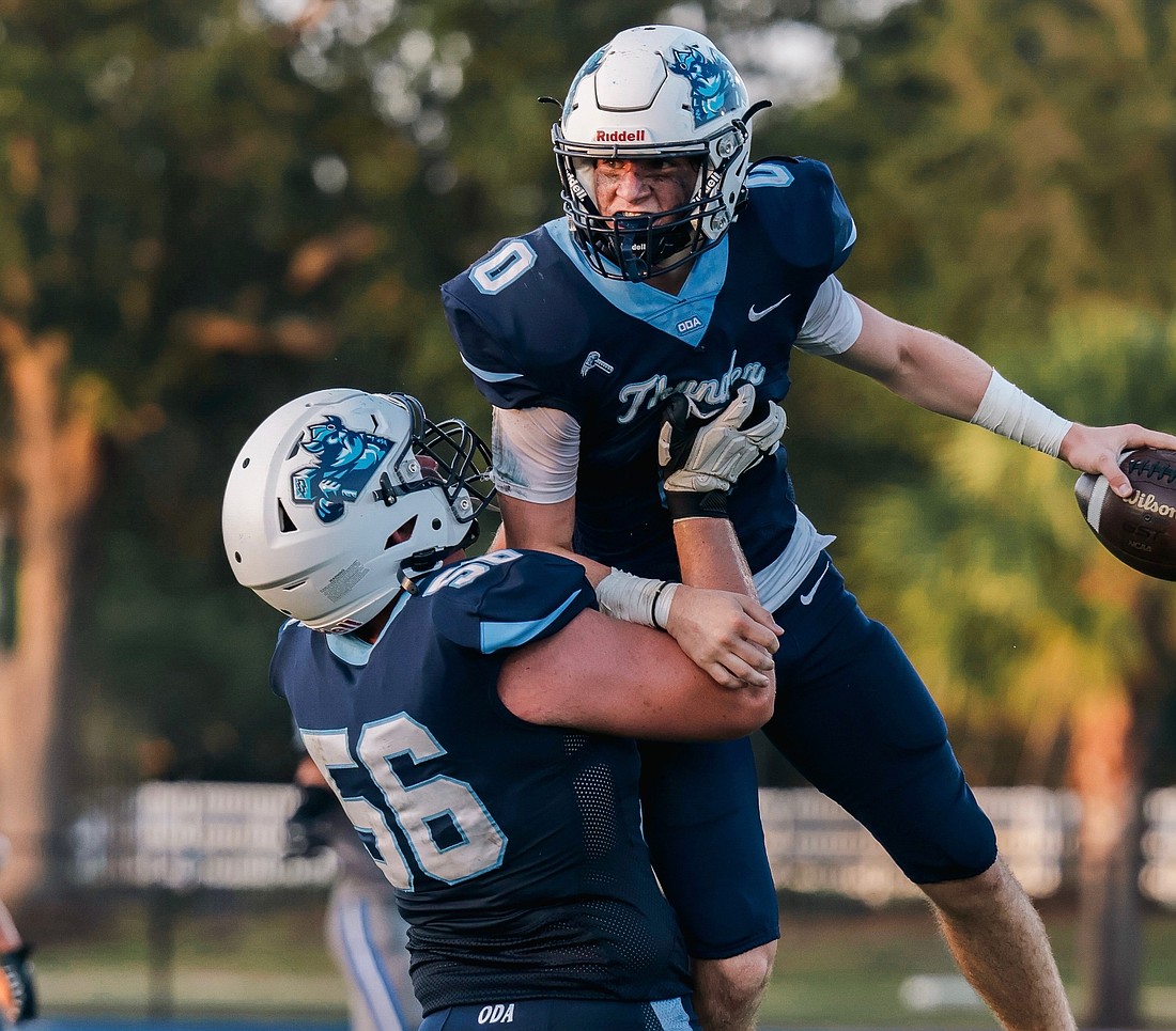 Out-of-Door Academy freshman Michael Garzia (No. 0) ran for over 100 yards, scored a touchdown and made an interception in the a 19-14 win over The Master's Academy on May 15.