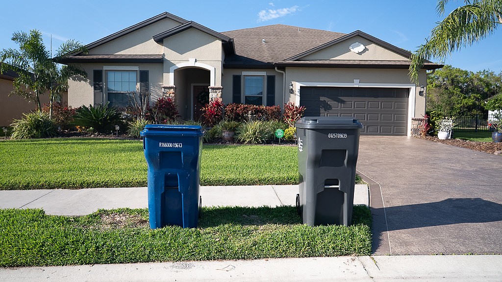 The big bins are just 4 inches taller than the recycling bins and 1 inch wider.