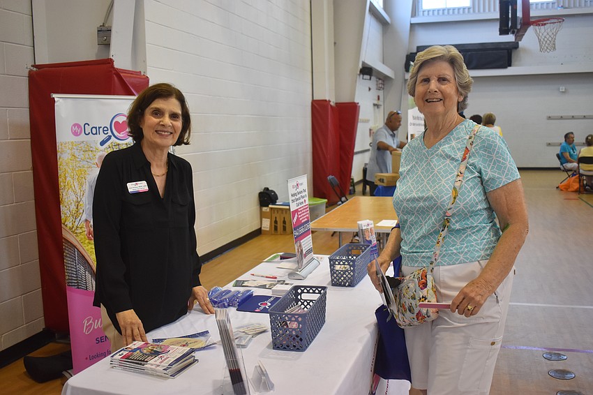 MyCareFinders' senior care advisor Jean Kramer informs Lakewood Ranch resident Janet Stewart about services the company provides including assisting in finding senior living communities at no cost to the client.