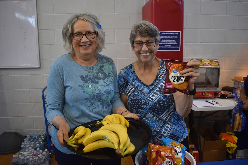 Marcia Anderson and Donna Foster have both been members at the Lakewood Ranch YMCA for 4 years. Both of them acted as volunteers for the event and handed out snacks to those checking out the resource booths.