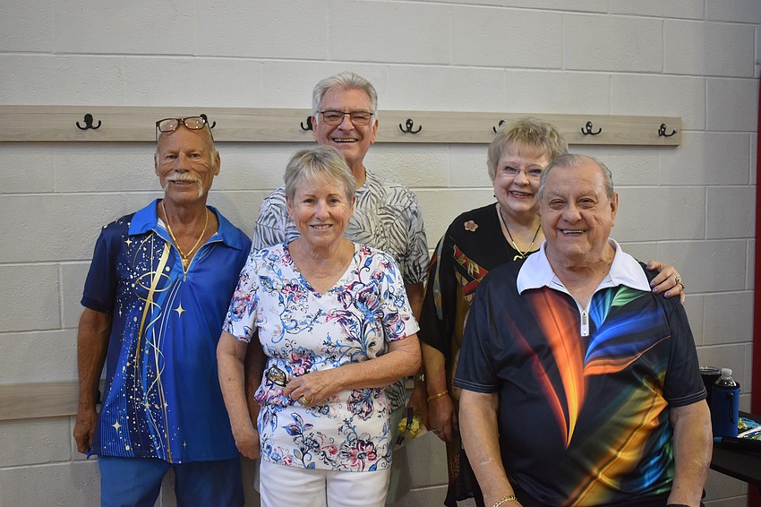 Bradenton's John Wayne Greenwell, The Alloro at University Groves' Patrick and Marilyn Moran and Lakewood Ranch's Chuck and Phyllis Lynn have been friends for years.