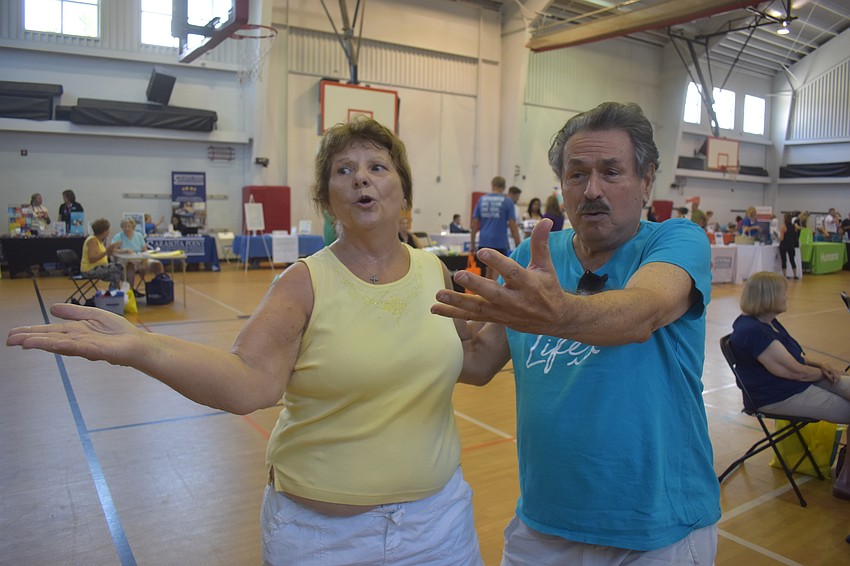 Creekwood's Sue and Rich Schwartz, who have been married for 44 years, dance along to music by Lynn's Spins. Rich says he wants to keep himself loose and describes him and his wife as 