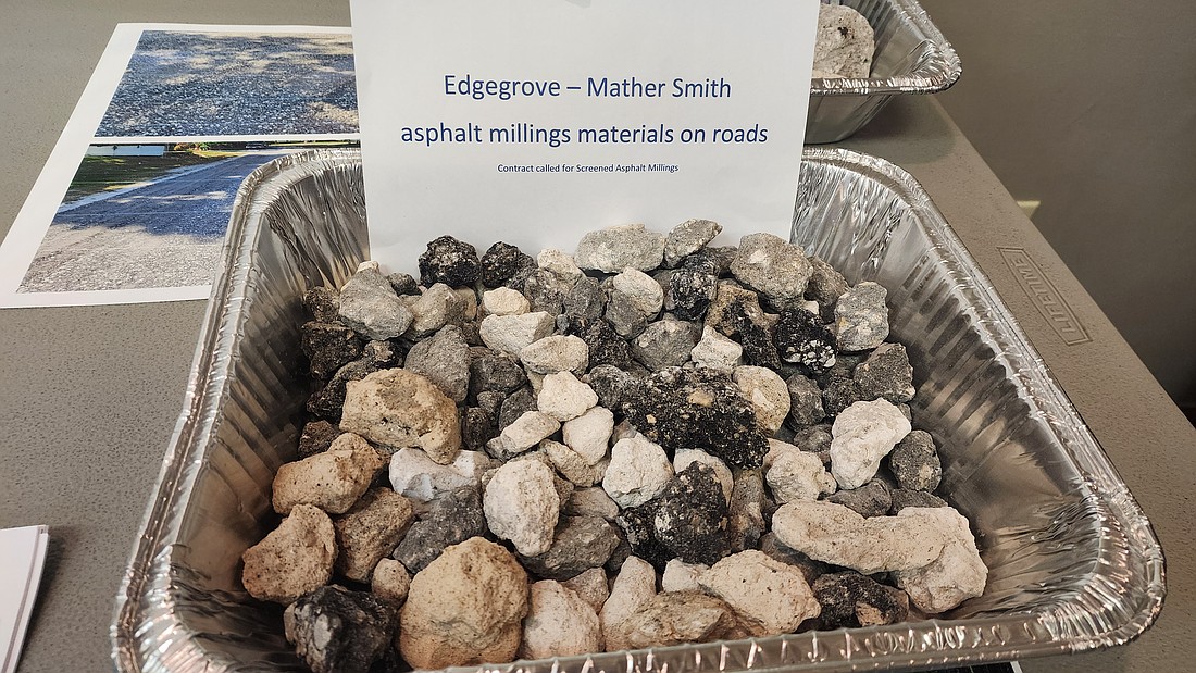 Resident Scott Hren provided asphalt millings from Edgegrove Lane.