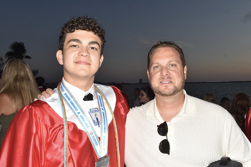 Michael Navarro-Lenza poses with his father Geoffrey Lenza.