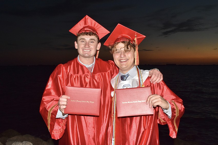 Keaton White poses with his best fiend Juan Muñoz.