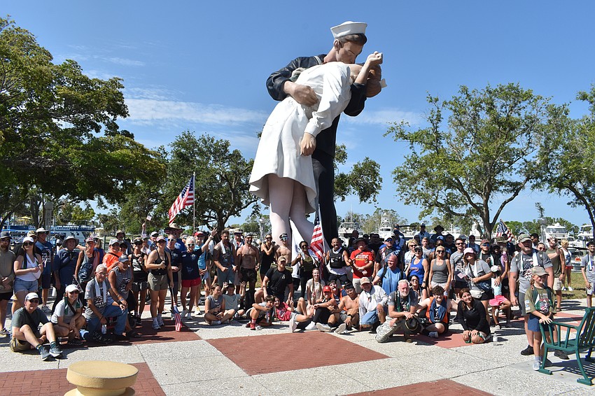 Hikers gather in front of the 