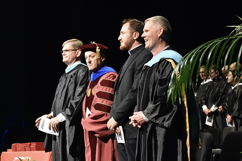 Principal Ben Hopper, John Belmonte, Superintendent of Catholic Education at the Diocese of Venice in Florida, Cardinal Mooney Chaplain Alex Pince and Assitant Principal Stefan Gates are recognized.