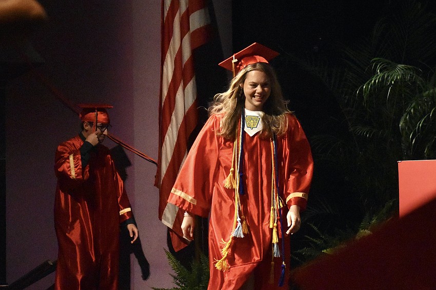 Bryan Rogelio Cruz and Cecilia Anne Cosgrove make their way onto the stage.