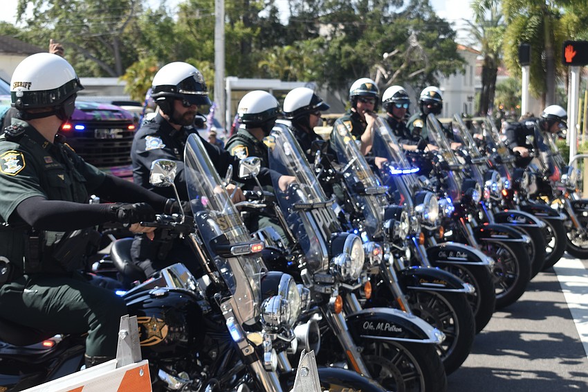 The Sarasota County Sheriff's Office leads the parade.
