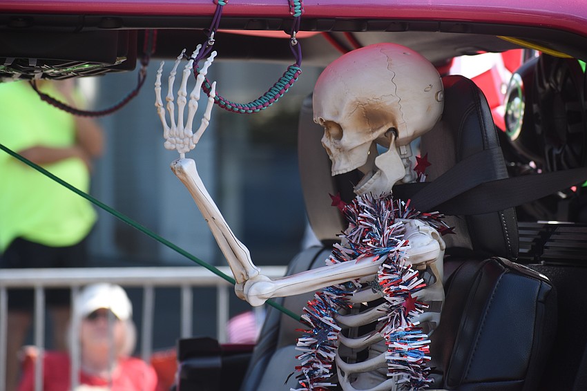 A skeleton decoration honors the fallen inside a jeep.