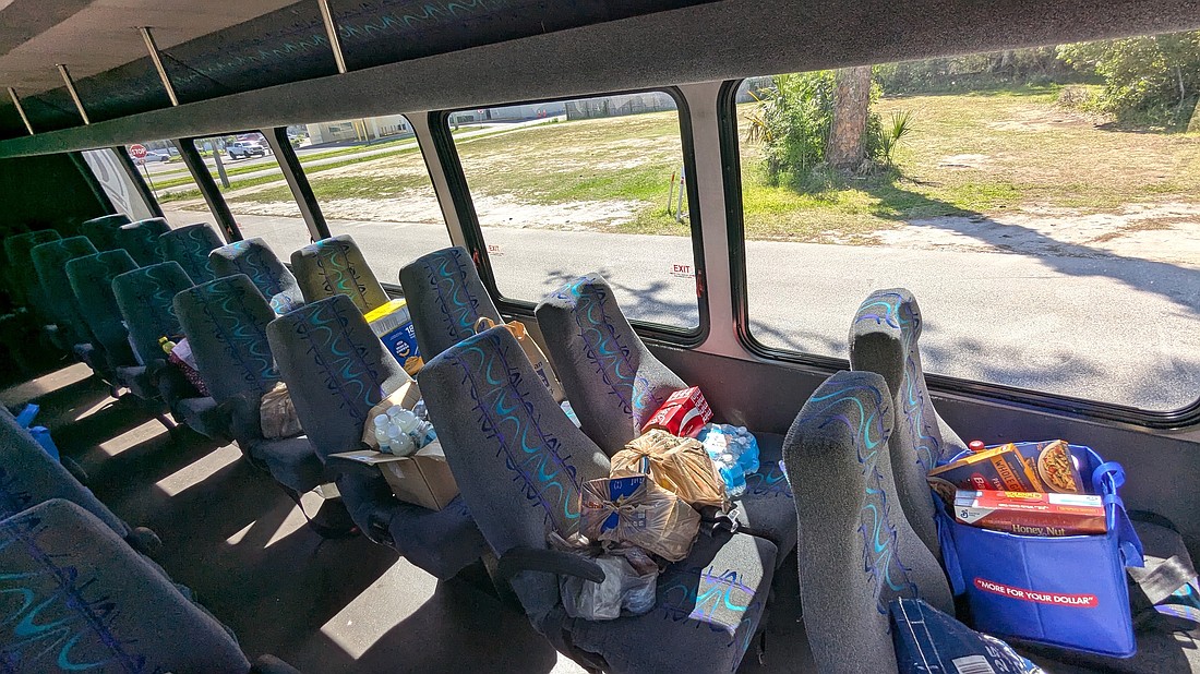 First Baptist Christian Academy 'stuffed the bus' for its food drive for Care Cupboard Food Pantry. Courtesy photo