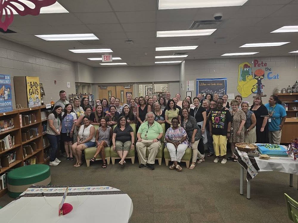 Whispering Oak Elementary staff gathered to celebrate the retirement of School Secretary  Diane Garner, second-grade teacher Sonia Robinson, fifth-grade teacher Michele Tanski and first-grade teacher John Warpenburg.