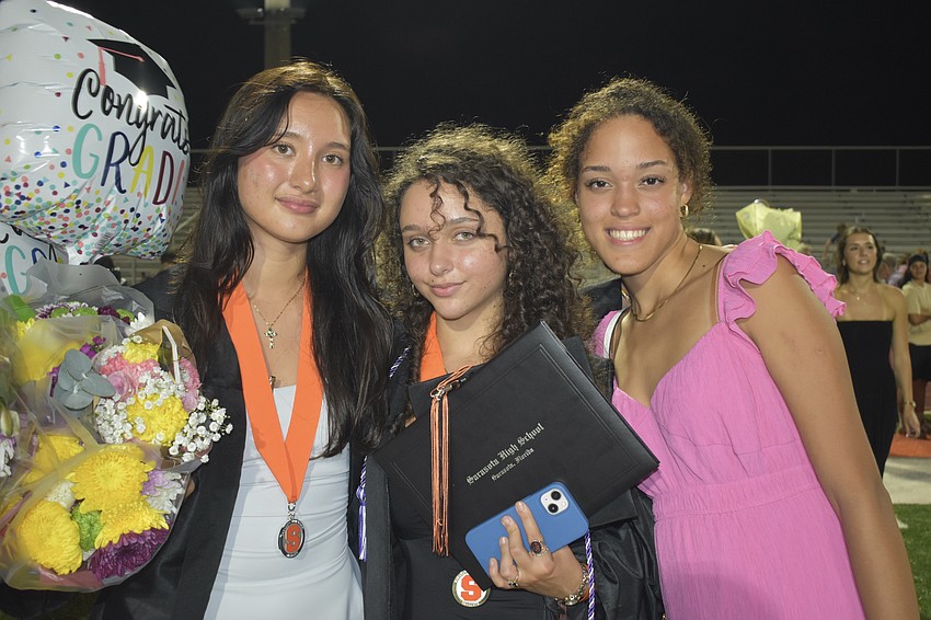 Graduates Chaya Steckel and Violet Faulkner, and Sarasota High School junior Claudia Viamonte