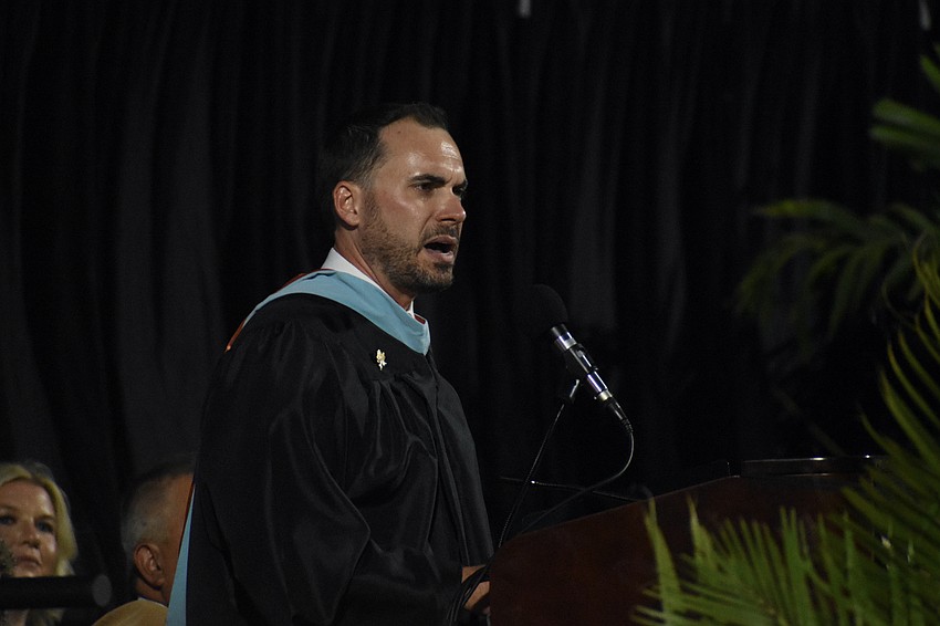 Principal Ryan Chase addreses attendees.