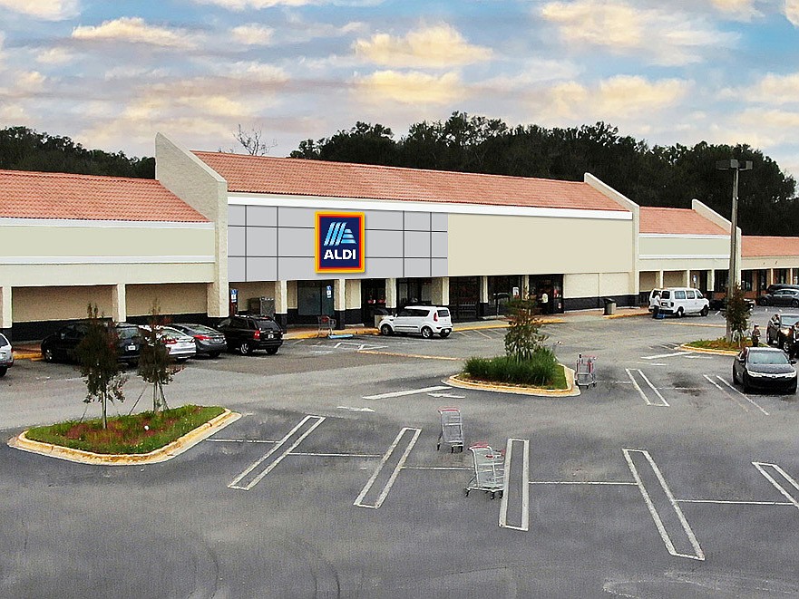 A brochure for Monument Pointe Plaza near East Arlington show “Aldi Coming Soon” at the Winn-Dixie store at 1531 Monument Road.