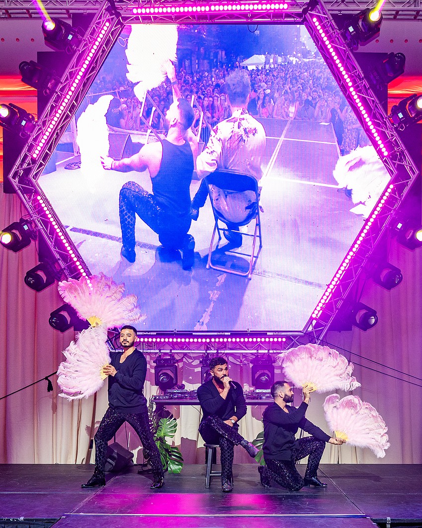 John Duff with his backup dancers.