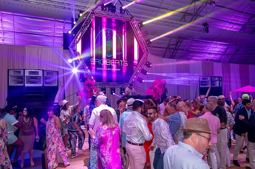 Attendees pack the dance floor.